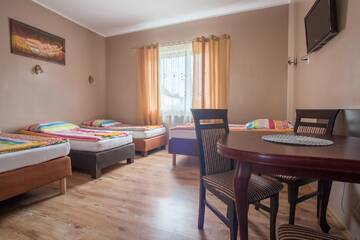 Фото номера Четырехместный номер Мотели Motel "Płomyk" г. Kunowice 5
